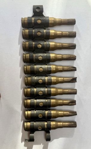 Machine gun bullet cases - ,