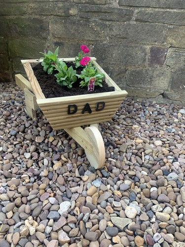Wooden wheelbarrow planter