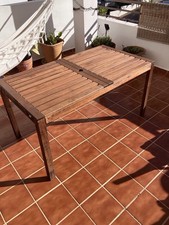 IKEA solid wood extendable table. Has two separate leaves to extend to 2.6M max.