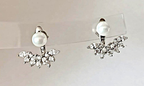 Diamonique and simulated pearl - and,
