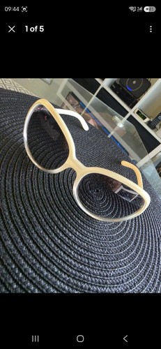 Prada luxottica sunglasses - luxottica,