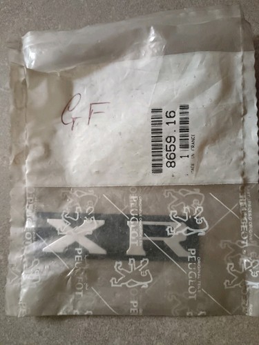 Peugeot 205 written logo - written,