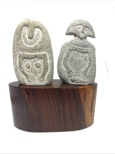 Primitive carved stone man - stone,