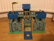 LE Toy Van wooden castle with drawbridge . Good condition. Can deliver