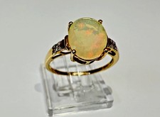 9ct  solid Yellow Gold and 2 Carat Opal  - Size P half