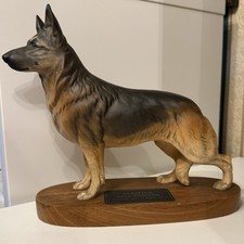 Beswick Alsatian on wooden