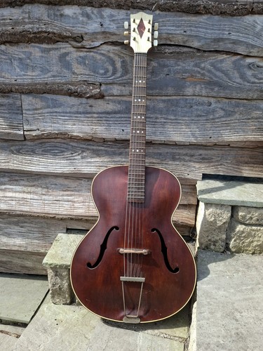 Old accoustic archtop guitar - old,
