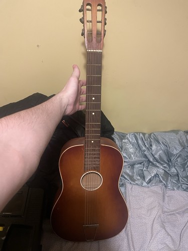 Six string parlour guitar - six,