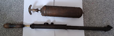 Vintage brass fire extinguisher ( empty ) and a stirrup pump
