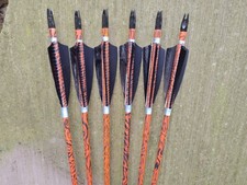Six handmade wooden arrows for