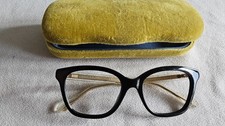 Gucci black / honey glasses frames. GG 0566O.