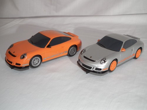 Two scalextric porsche - porsche, gt3rs
