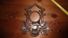old wood cuckoo clock part black forest hunting germany poacher face front bugle