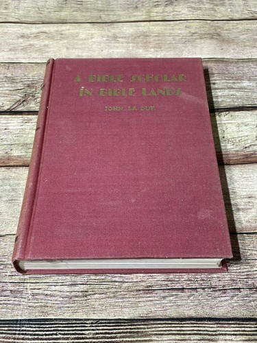 Bible scholar lands - in,