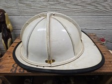 white leather fire helmet