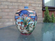 MOORCROFT   POTTERY. INDIAN PAINTBRUSH PATTERN TOBBACO JAR.  PHILLIP GIBSON.