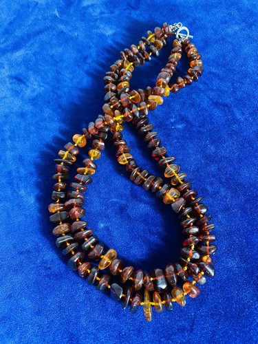 Double string amber beads with - double,