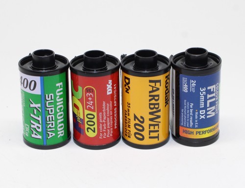 Four 35mm film rolls - four,