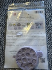 Karen Davies Baby Button