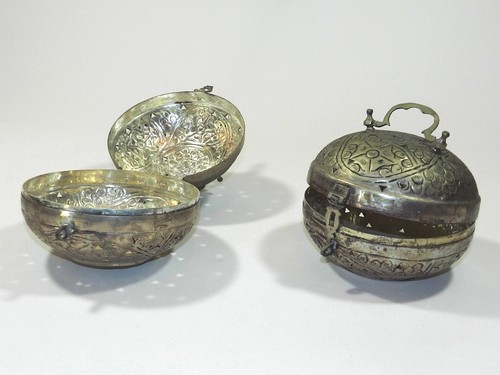 Round metal betel nut trinket - metal,