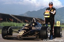 Ayrton Senna next to iconic F1 Lotus 97T - Colour Photo