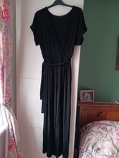 F&F Size 14 black jumpsuit. Wide leg, wrap-style v neck with fabric belt.