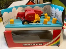 BRITAINS.1/32..FARM.NEW HOLLAND 377 BALER.BALES.TRACTOR DRAWN.VINTAGE.BOXED