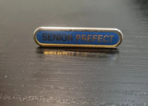 Senior prefect brass - prefect, and