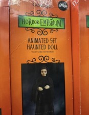 Animated haunted doll new - haunted,