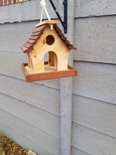 Hanging wooden bird feeder