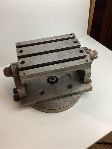 Tilting slot table - t,