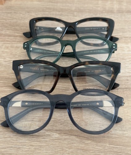 Four pairs gucci glasses - four,
