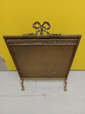 Antique Solid brass plain fronted fire screen that heats up your home. 