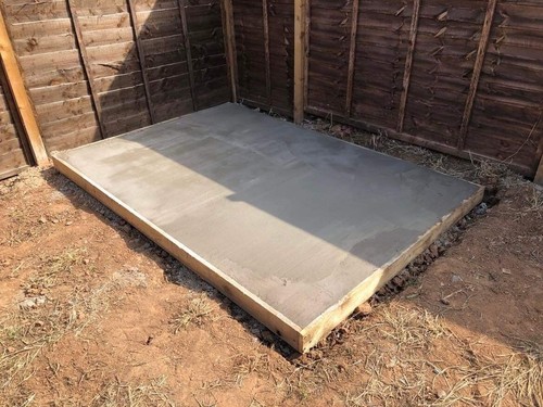 Concrete shed base with - shed,