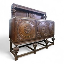 Antique bulbous carved oak bow