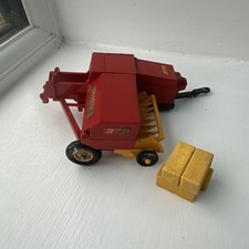 Britains New Holland 376 Hay Baler With Bales. Working