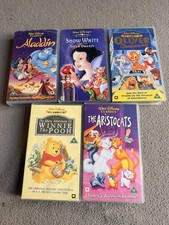 Winnie The Pooh, Aladdin, Snow