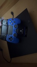 Sony PlayStation 4 with two