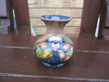 MOORCROFT POTTERY . LIGHTLY FLAMBE COLUMBINE PATTERN VASE