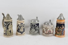 C23U38- 5x beer steins with relief decor stoneware ceramic and pewter lid 