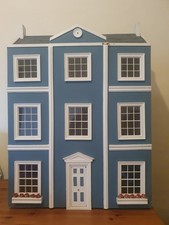 Lovely handmade wooden three-storey front-opening dolls house, fully furnished