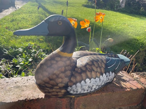 Hand carved and painted - carved,