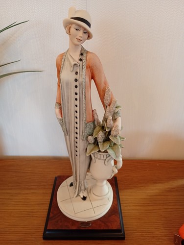 Guiseppi armani lady with vase - armani,