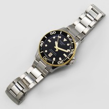 Unisex Tissot Seastar 36mm Black and Gold Colour Stainless Steel T1202102105100