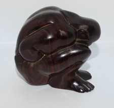 wooden carved weeping buddha