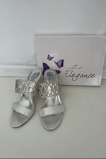 Gorgeous Lunar Elegance Silver Sandals- Size 5