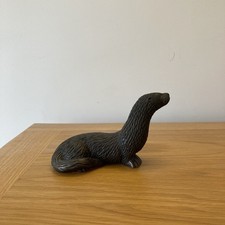Bronze Crouching Otter