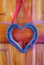 Horseshoe hearts hand forged