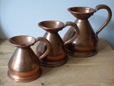 TRIO COLLECTABLE OLD VINTAGE SET COPPER KITCHENALIA WATER BEER MEASURING JUGS