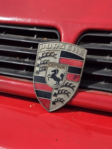 Porsche 911 front hood badge - front,